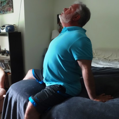 Sitting Camel to target your tight chest, shoulders, neck and forearms.